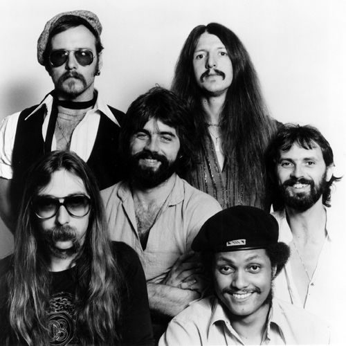 Doobie Brothers album cover. Black and White photo of the Doobie Brothers.